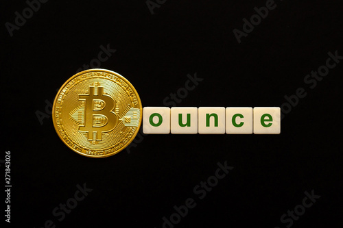 Word Bounce made up of cubes. The first letter of the word is symbolized by a bitcoin coin. Concept of strong BTC, bitcoin growth rate, price increase, blockchain confidence, positive price outlook.
