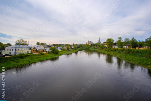 Panorama of Torzhok with views of the river and dwelling houses and a church standing in the distance © Dmitry Vereshchagin