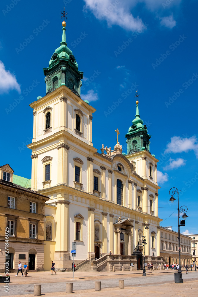 Warsaw, Poland - Front view of the baroque Holy Cross Church, at the Krakowskie Przedmiescie street in the Old Town quarter of Warsaw