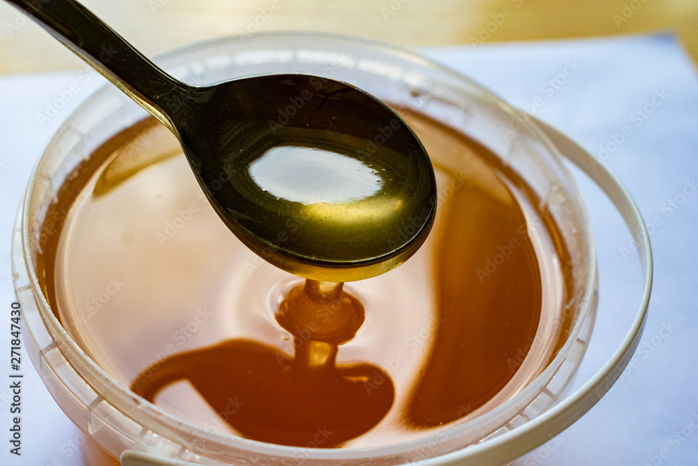Spoon of fresh spring may honey Spoon of fresh spring may honey