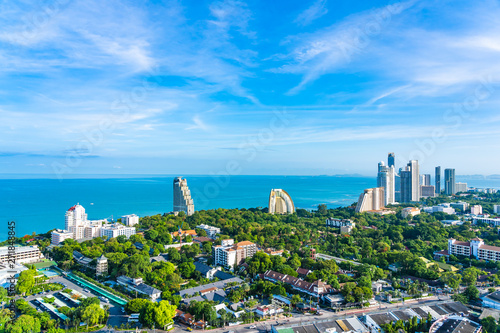 Pattaya Chonburi Thailand - 28 May 2019 : Beautiful landscape and cityscape of Pattaya city is popular destination in Thailand with white cloud and blue sky photo