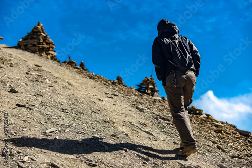 tourist on the background of the Himalayas, Nepal. Manang village, December 2017 photo