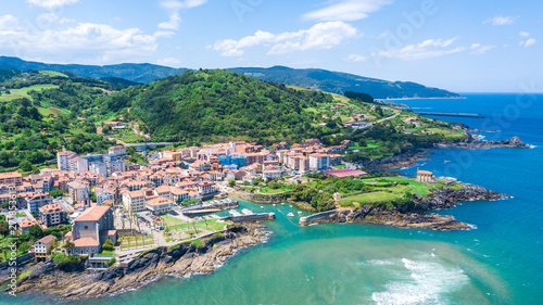aerial view of basque fishing town and its coastline © jon_chica