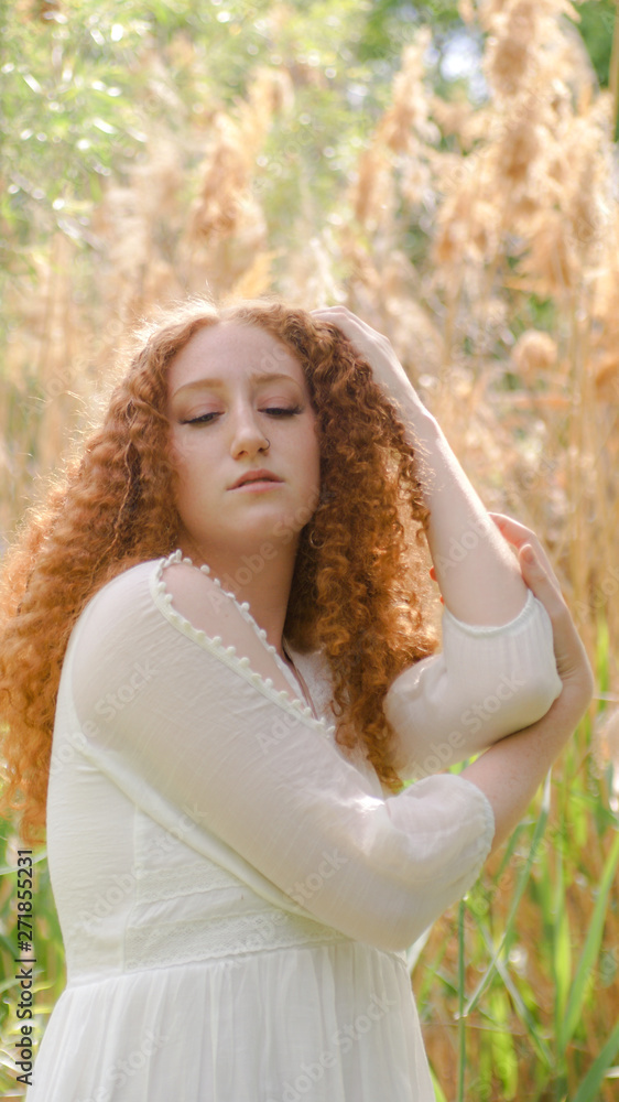 free spirited boho redheaded princess in golden meadow free spirited boho redheaded princess in golden meadow