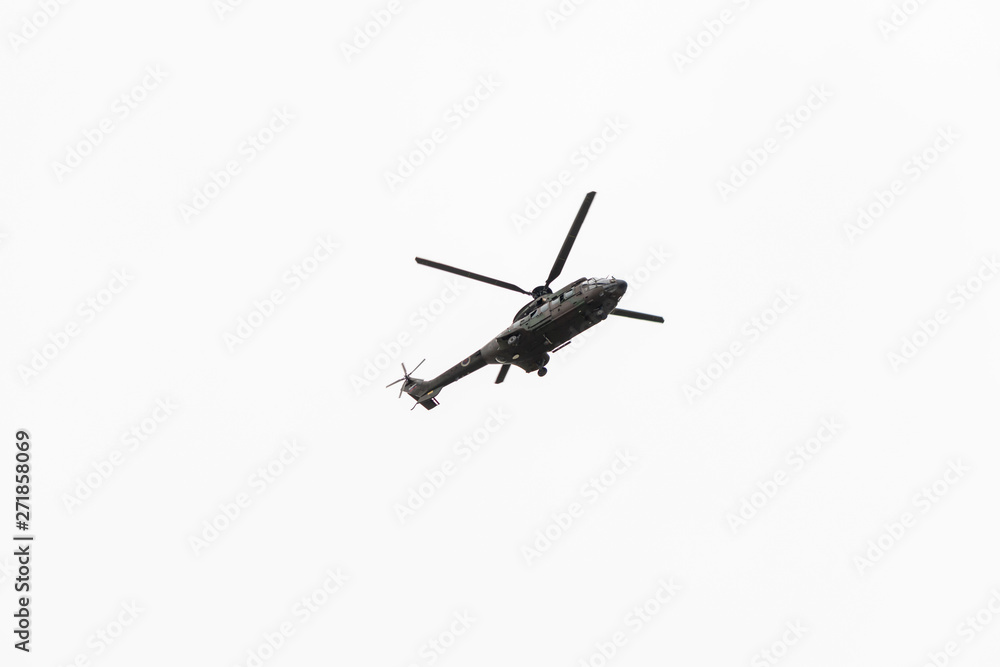 Military navy helicopter flying isolated on white background Military navy helicopter flying isolated on white background