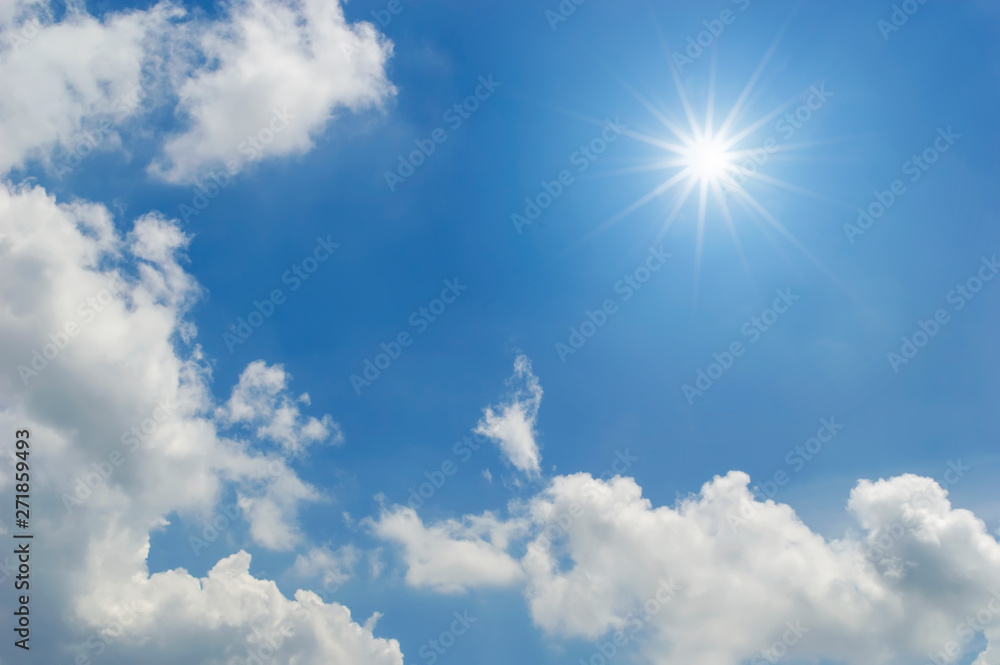 clouds and blue sky with sun