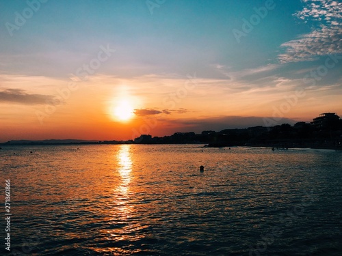 Fototapeta Naklejka Na Ścianę i Meble -  Sunset landscape on the sea shore