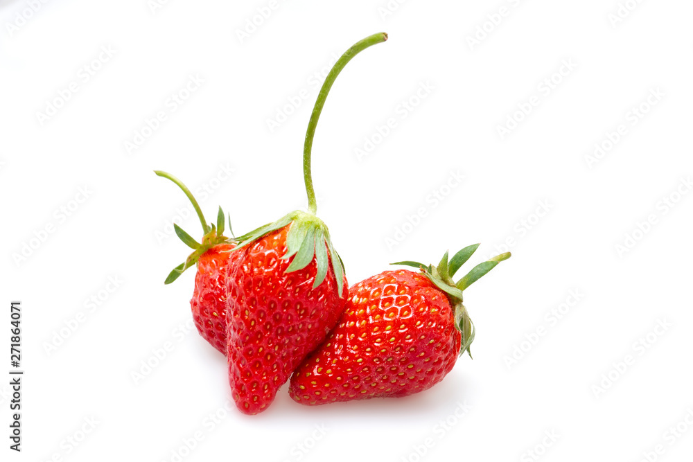 Red strawberries with a white background.. Red strawberries with a white background..