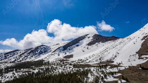 Aerial, drone panorama of Virginia Lakes landscape with snow capped mountains