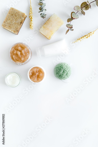 Natural herbal cosmetics with wheat on white background top view space for text