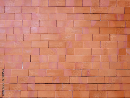 Red moss brick wall is used as a background.