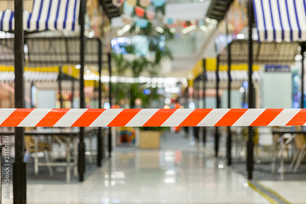 Obraz premium Red and White Lines of barrier tape. Striped, red and white tape that forbids passage. Red White warning tape pole fencing is protects for No entry.