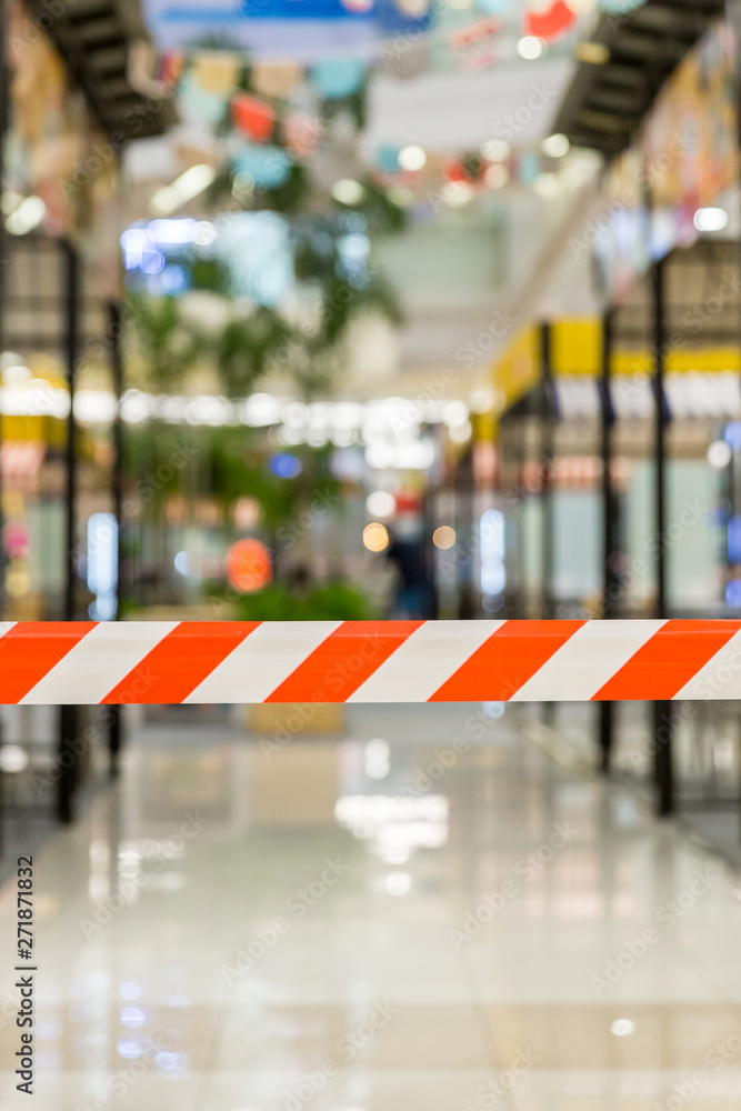 Red and White Lines of barrier tape. Striped, red and white tape that forbids passage. Red White warning tape pole fencing is protects for No entry. Red and White Lines of barrier tape. Striped, red and white tape that forbids passage. Red White warning tape pole fencing is protects for No entry.