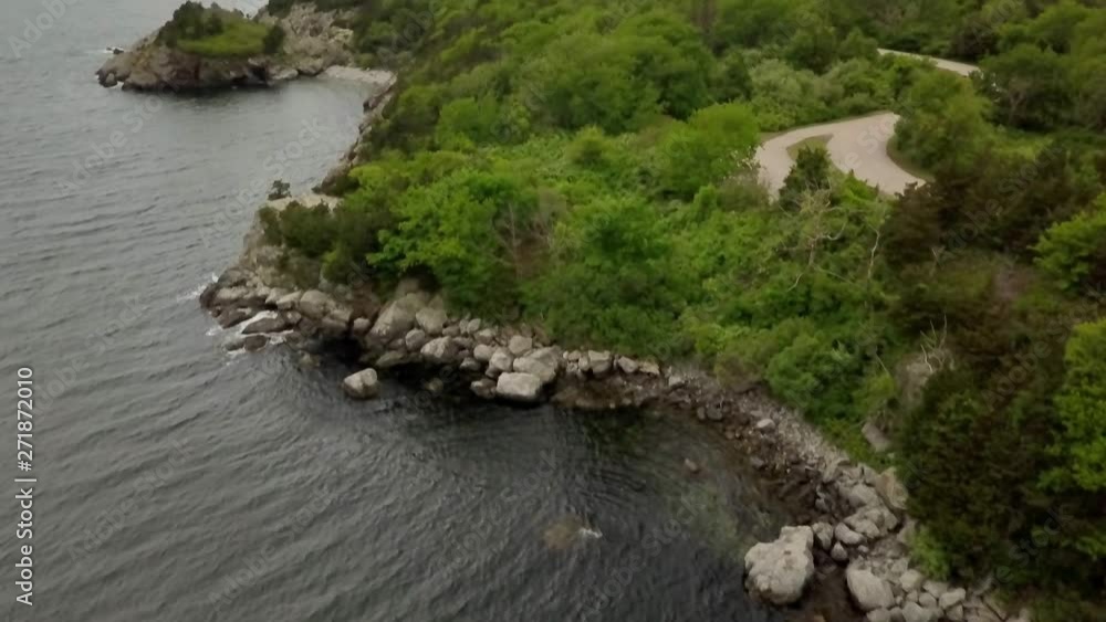 Aerial reveal along shoreline of Wetherill State Park, Rhode Island