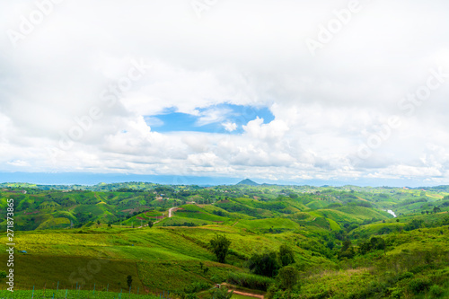 Blue sky high peak mountains fog hills mist scenery national park views at Phu Tub Berk, Khao Koh, Phetchabun Province, Thailand