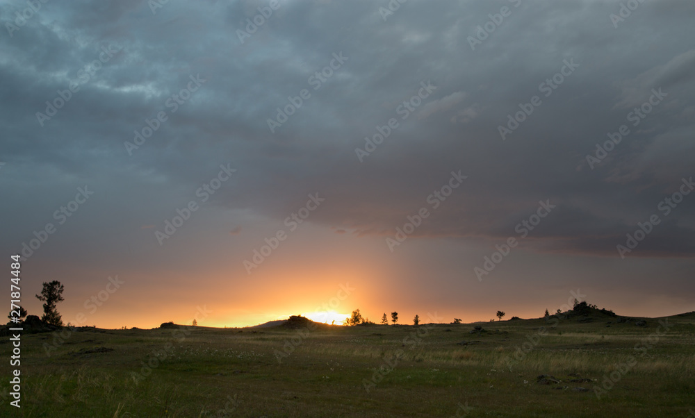 Fototapeta premium Summer thunderstorm in Khakassia chiaroscuro and clouds