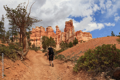 Hiker on trail in Bryce Canyon National Park, Utah, USA