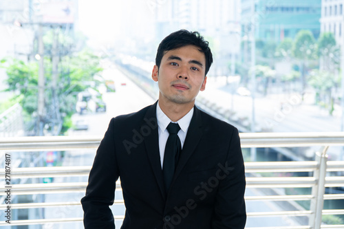 Asian Business man in the formal suit. © littlekop