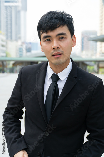 Asian Business man in the formal suit.