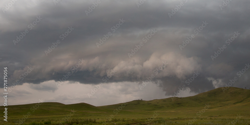 a storm begins and a thunderstorm happens in the mountains of Russia