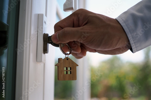Landlord unlocks the house key for new home