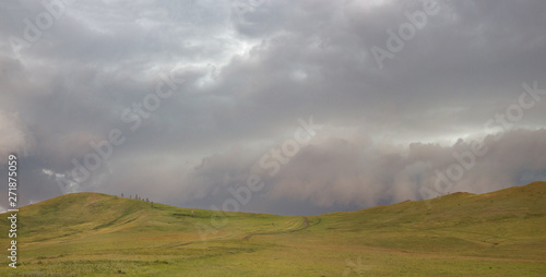 a storm begins and a thunderstorm happens in the mountains of Russia