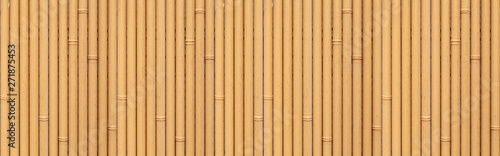 Photo Panorama of Brown bamboo fence seamless background and pattern