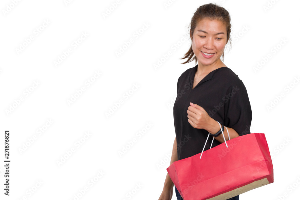 Asian girl happy smiling while holding shopping bag. isolated background. Asian girl happy smiling while holding shopping bag. isolated background.