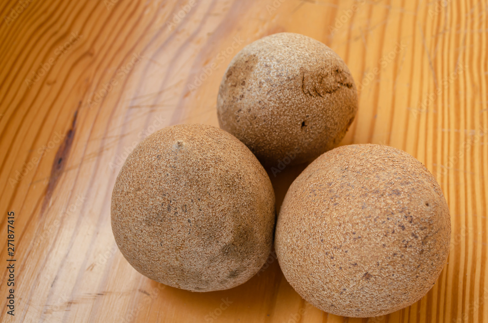 Fototapeta premium Sapodilla Fruits On Board 