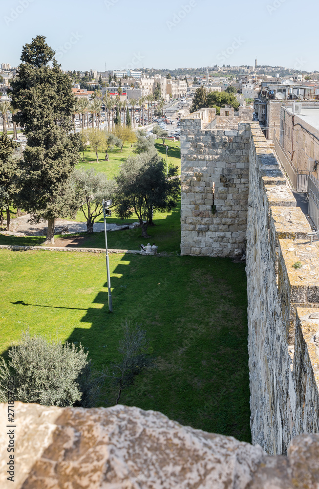 Pedestrian part of the city wall near the New Gate in old city of Jerusalem, Israel