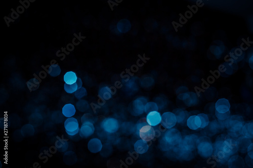 Abstract blue bokeh  texture on black