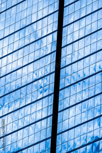 Blue glass windows of office building