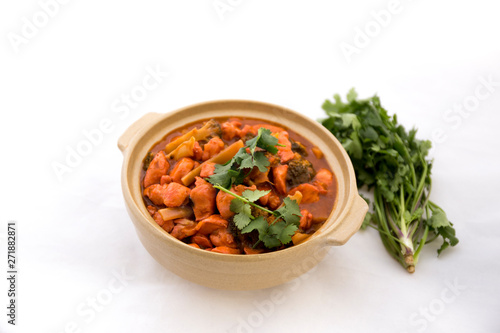 Butter chicken curry with Broccoli in Bowl