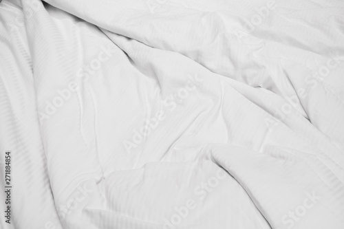 White delicate soft background of fabric or bedding sheet