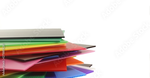 Group of corrugated plastic sheets on white