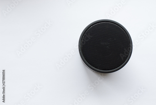 Black Bluetooth speaker on white background