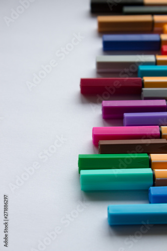 Set of colorful pens on white background