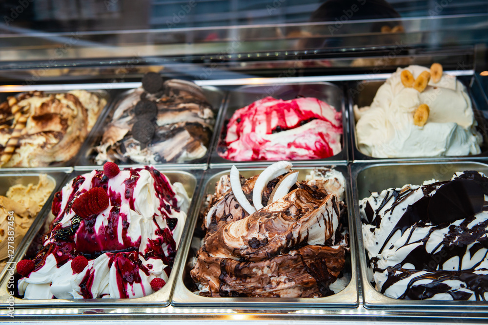 Ice cream in Rome, Italy. Italian gelateria. Ice-cream cafe, show window with sweeties.