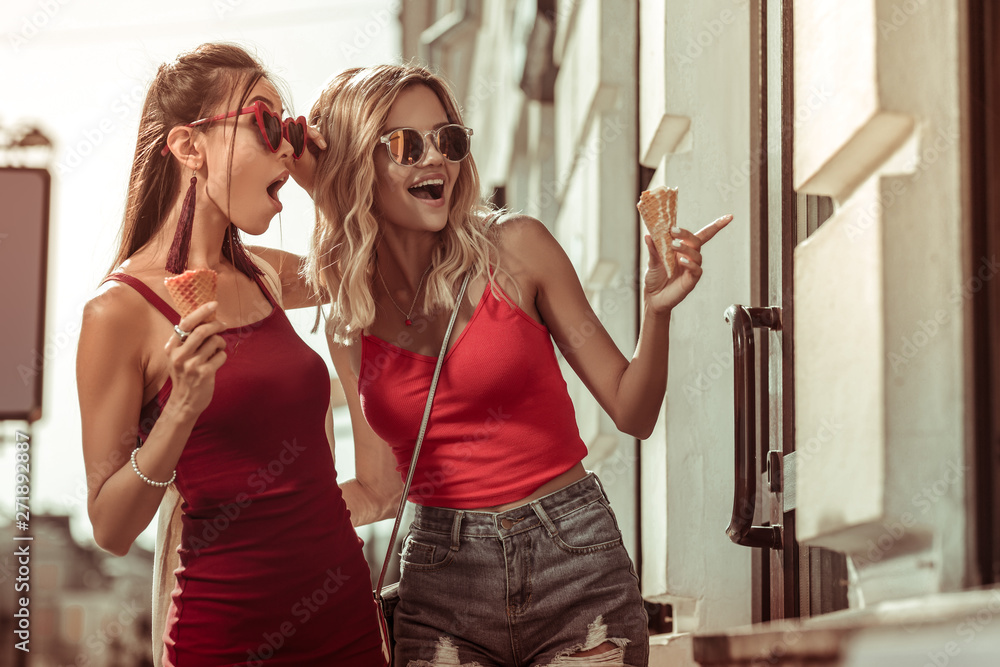 Fototapeta premium Beautiful nice-appealing stunning charming arresting glamorous ladies doing window shopping