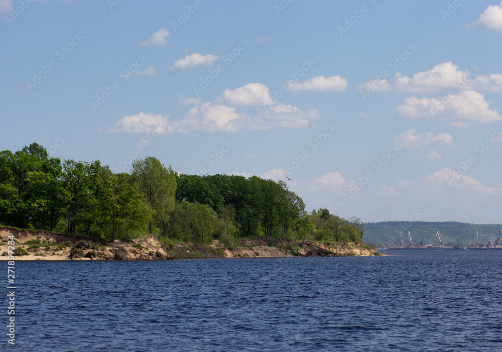 Scenis view of river bay, trees and sky Scenis view of river bay, trees and sky