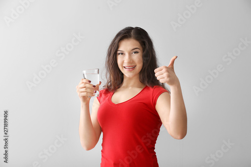 Beautiful young woman with ...