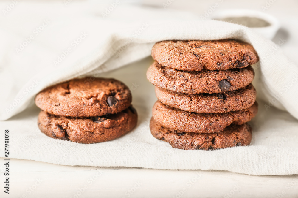 Tasty chocolate cookies on light table Tasty chocolate cookies on light table