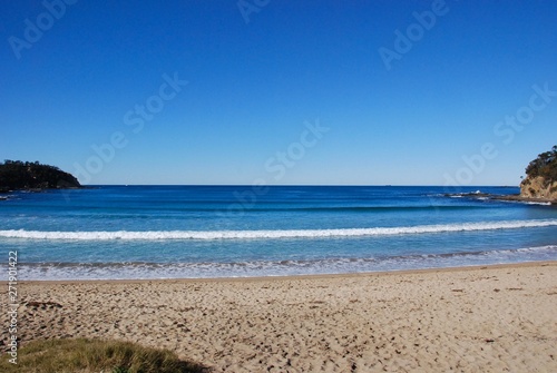 Fototapeta Naklejka Na Ścianę i Meble -  Seascape with blue sky. Nobody on the beach. Tranquil scenery in Australia.