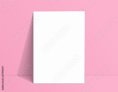 White poster mockup standing on the floor near pink wall. Blank Canvas Mockup for design