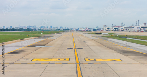 Panorama of airplanes on taxiway in airport. Path for aircraft transfer to and from runway.
