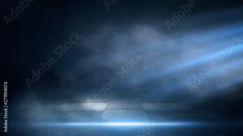 Dark empty scene, blue neon searchlight light, wet asphalt, smoke, night view, rays. Empty black studio room. Dark background. Abstract dark empty studio room texture. Product showcase spotlight back