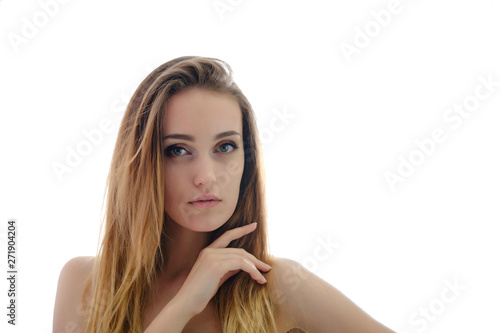 Photograph of a portrait of a beautiful fashionable beauty woman girl with long dark flowing hair, isolate on a white background. She is standing in different poses and smiling.