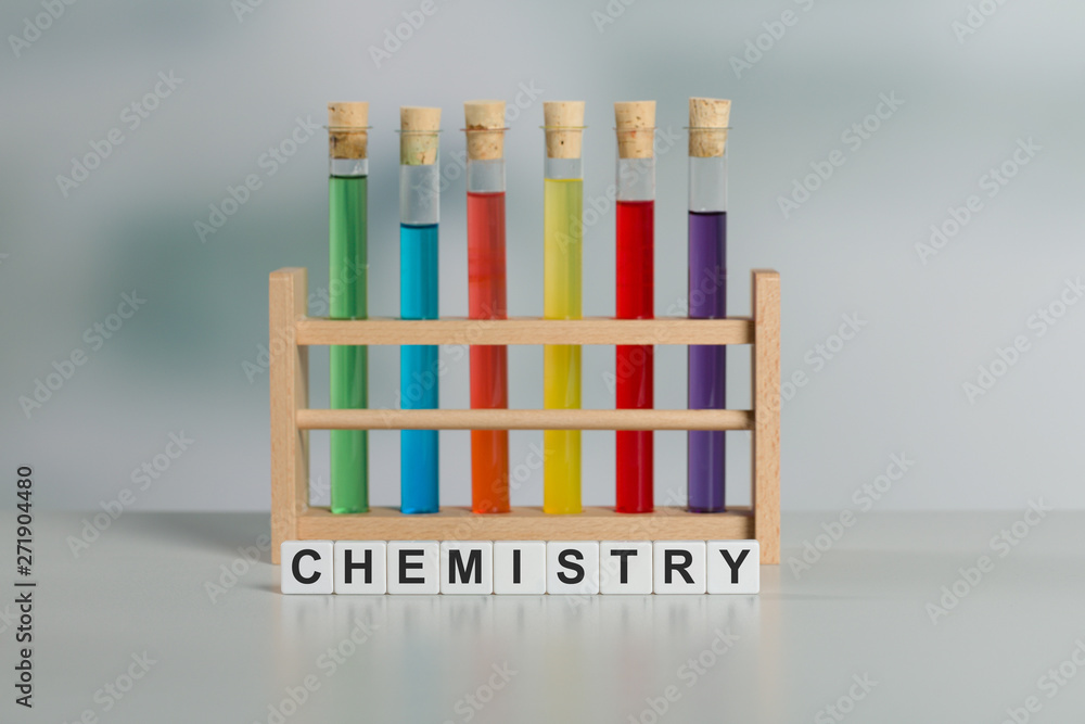test tube rack with colorful liquids in test tubes and the word chemistry test tube rack with colorful liquids in test tubes and the word chemistry
