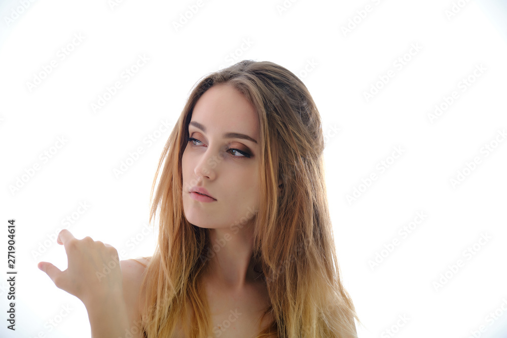 Photograph of a portrait of a beautiful fashionable beauty woman girl with long dark flowing hair, isolate on a white background. She is standing in different poses and smiling. Photograph of a portrait of a beautiful fashionable beauty woman girl with long dark flowing hair, isolate on a white background. She is standing in different poses and smiling.