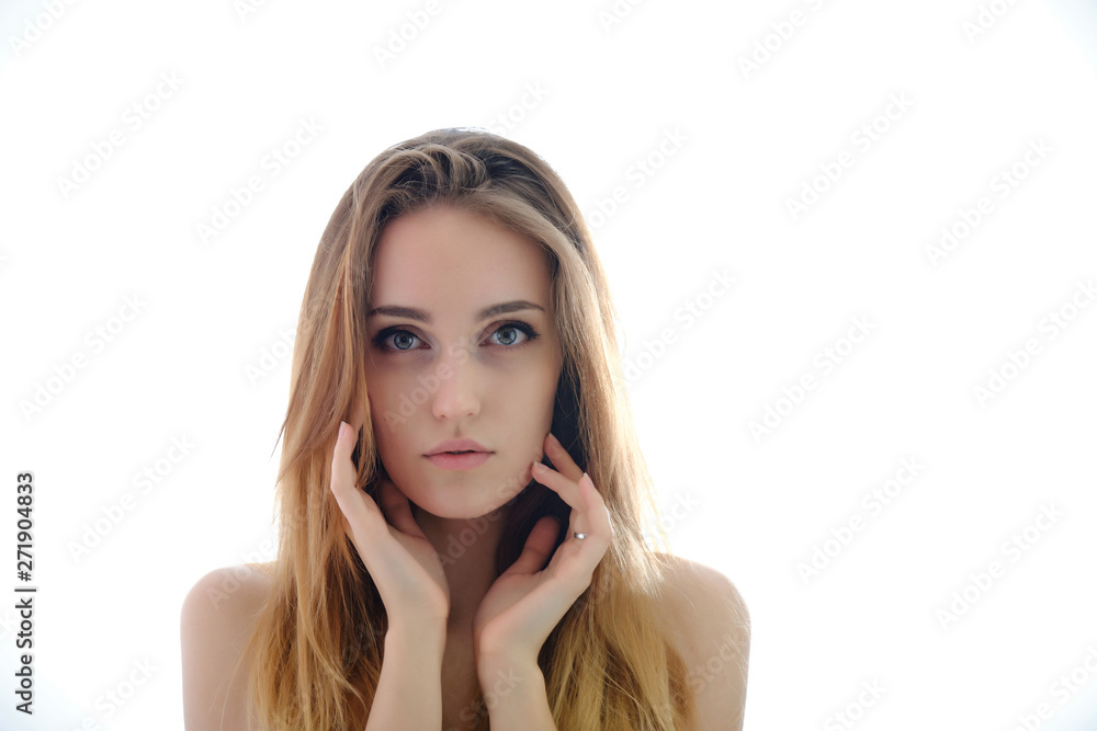 Photograph of a portrait of a beautiful fashionable beauty woman girl with long dark flowing hair, isolate on a white background. She is standing in different poses and smiling. Photograph of a portrait of a beautiful fashionable beauty woman girl with long dark flowing hair, isolate on a white background. She is standing in different poses and smiling.